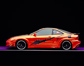 AUT 34 RK0389 05
2001 Acura Integra Orange Profile View Studio