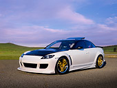 AUT 39 RK0358 01
2004 Mazda RX-8 White Black Top Low 3/4 Front View On Pavement