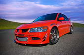 AUT 40 RK0258 01
2005 Mitsubishi Lancer Evolution VIII Red Low 3/4 Front View On Pavement