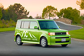AUT 41 RK0594 01
2006 AC Propulsion eBox Green 3/4 Front View On Pavement By Trees
