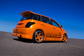 AUT 41 RK0514 01
2006 Toyota Scion XA Orange Low 3/4 Rear View On Pavement