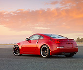 AUT 42 RK0283 01
2007 Nissan 350Z Red 3/4 Rear View On Pavement At Dusk