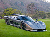 AUT 44 RK0099 01
2009 IAD/Mosler MT900 GTR Gray 3/4 Front View On Grass