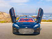AUT 44 RK0113 01
2009 Spyker C8 Aileron Gray Front View On Pavement By Ocean