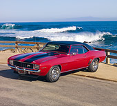CAM 01 RK0174 01
1969 Chevrolet Camaro Z-28 Red With Black Stripe 3/4 Front View By Ocean