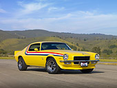 CAM 04 RK0124 01
1971 Chevrolet Camaro Yellow With Stripes 3/4 Front View On Pavement By Hills