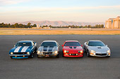 CAM 04 RK0106 01
1969, 1973, 1986 & 2002 Chevrolet Camaros Head On View By Hangar