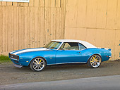 CAM 07 RK0099 01
1968 Chevrolet Camaro RS/SS Blue And White Stripe 3/4 Front View On Pavement By Fence