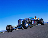 DCA 01 RK0002 01
Blastolene Special Concept Race Car 3/4 Front View Moving On Pavement Blue Sky