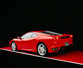 FRR 04 RK0364 09
2005 Ferrari F430 Red 3/4 Rear View On Red Floor Gray Line Studio