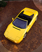 FRR 08 RK0065 04
1994 Ferrari 348 Spyder Yellow Overhead Shot On Brick Pavement