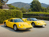 FRR 17 RK0007 01
1969 Ferrari Dino 246 GT Coupe Yellow And 1973 Ferrari Dino 246 GTS Spyder Yellow 3/4 Front View On Pavement By Shrubs