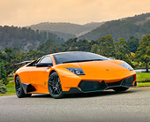 LAM 01 BK0012 01
2010 Lamborghini Murci�lago LP670-4 SV Orange 3/4 Front View On Pavement By Hills