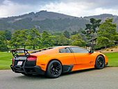 LAM 01 BK0013 01
2010 Lamborghini Murci�lago LP670-4 SV Orange 3/4 Rear View On Pavement By Hills
