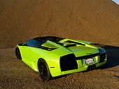 LAM 01 RK0588 01
2006 Lamborghini Murcielago Roadster Lime Green 3/4 Rear View On Sand