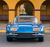 LAM 01 RK0688 01
1965 First Lamorghini 350GT Azure Blue Front View On Pavement By Building