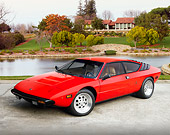 LAM 01 RK0706 01
1974 Lamborghini Urraco Red 3/4 Front View On Driveway