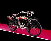 MOT 01 RK0605 01
1914 Premier, 250, Red And Black Motorcycle 3/4 Side View On Red Floor Studio