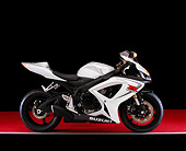MOT 02 RK0299 02
2006 Suzuki GSXR 600 Silver And White Profile View On Red Floor Studio