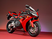 MOT 02 RK0308 01
2006 Honda CBR 1000RR Red Side 3/4 View On Red Floor Studio