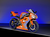 MOT 02 RK0375 02
2006 Triumph Daytona Triple Orange With Checkers 3/4 Side View Studio