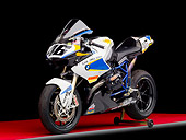 MOT 02 RK0430 01
2009 BMW HP2 Sport White, Yellow, Blue 3/4 Front View Studio