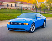 MST 01 RK1177 01
2010 Ford Mustang GT Premium Coupe Blue 3/4 Front View On Pavement By Mansion