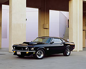 MST 01 RK0262 04
1969 Mustang Boss 429 Black Side 3/4 View On Pavement By Pillars Parking Lights On