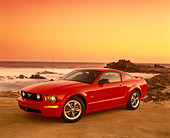 MST 01 RK0813 02
2005 Ford Mustang GT Coupe Red 3/4 Side View On Sand