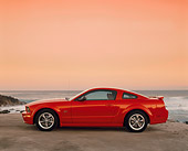 MST 01 RK0814 02
2005 Ford Mustang GT Coupe Red Profile On Sand By Ocean Filtered