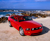 MST 01 RK0829 03
2005 Ford Mustang GT Convertible Red Overhead Front 3/4 View On Sand By Ocean