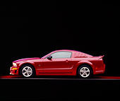MST 01 RK0891 09
2005 Ford Mustang Roush Red Profile On Red Floor Purple Lighting Studio