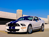 MST 03 RK0157 01
2007 Ford Shelby GT500 White Blue Stripe 3/4 Front On Pavement