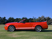MST 04 RK0042 01
2007 Ford Shelby Cobra GT500 Convertible Red Profile View On Grass