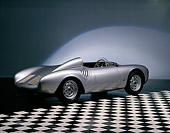 POR 06 RK0001 01
1957 Porsche 550A Silver Rear 3/4 View On Checkered Floor Studio