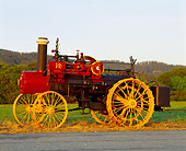 TRA 01 RK0002 06
1905 Russell Steam Tractor 3/4 Front View Beside Road By Hills