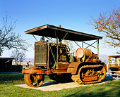 TRA 01 RK0016 01
1917 Holt 75 Tractor 3/4 Front View By Trees Blue Sky