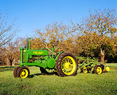 TRA 01 RK0033 01
1937 John Deere Model A & 4B Plow 3/4 Front View On Grass