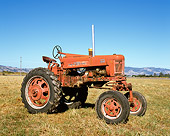 TRA 01 RK0110 01
1957 Farmall 350 High Clearance Red Tractor 3/4 Front View On Grass