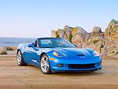 VET 01 RK0949 01
2010 Chevrolet Corvette Grand Sport Convertible Blue 3/4 Front View On Beach