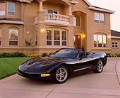 VET 01 RK0490 04
2001 Chevrolet Corvette Convertible Black 3/4 Front View On Driveway By House