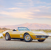 VET 03 RK0656 01
1969 Chevrolet Corvette 427 Convertible Gold 3/4 Front View On Pavement By Lake