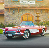VET 03 RK0663 01
1961 Chevrolet Corvette Convertible Maroon And White 3/4 Front View On Pavement By Building