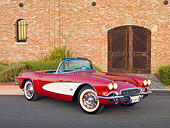 VET 03 RK0664 01
1961 Chevrolet Corvette Convertible Maroon And White 3/4 Front View On Pavement By Brick Building