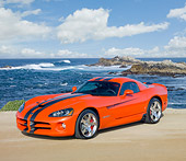 VIP 01 RK0304 01
2010 Dodge Viper SRT/10 Coupe Orange With Black Stripe 3/4 Front View On Beach