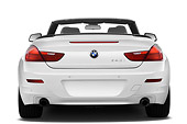 AUT 01 IZ0102 01
2011 BMW 6 Series 640i Convertible White Rear View On White Seamless