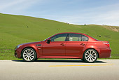 AUT 01 RK0249 01
2006 BMW M5 Burgundy Low Profile Shot On Pavement By Grass Hills