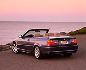 AUT 01 RK0105 02
2001 BMW 323Ci Convertible Blue 3/4 Rear View On Pavement By Water At Dusk