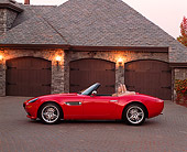 AUT 01 RK0124 05
2001 BMW Z8 Convertible Red Profile View On Driveway In Front Of Garage