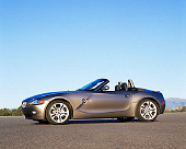AUT 01 RK0153 03
2003 BMW Z4 3.0i Convertible Gray 3/4 Front View On Pavement Blue Sky